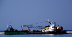 achilleas tug and a dredger laid up @ patras south port breakwater 100911