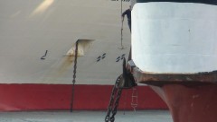 Vitsentzos Kornaros's stbd anchor in a tangle with Olympic Champion's port anchor chain c